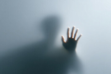 a person is seen through a foggy window