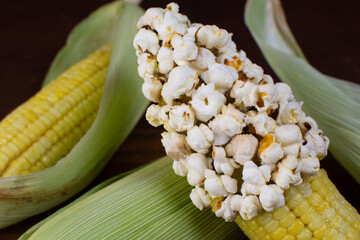 a close up of a corn with popcorn