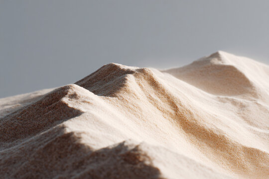 a close up of a sand hill with a sky background