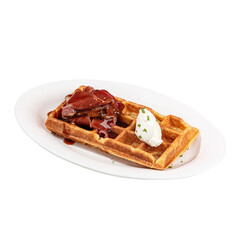 Portion of waffle with brisket and cream cheese