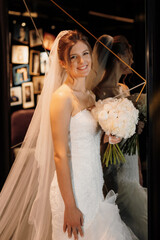 bride in a white dress at the training camp