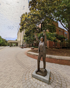 Raleigh, NC - USA - 5-25-2025: Jim Valvano statue in front of Reynolds Coliseum, on the campus of NC State University