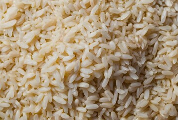 Close-up macro of dry, white rice grain texture makes a healthy food background