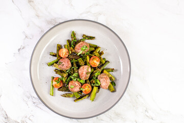 Green asparagus with Salsiccia