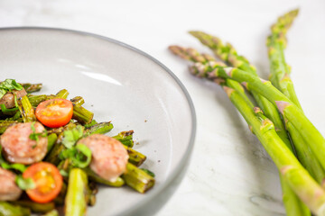 Green asparagus with Salsiccia