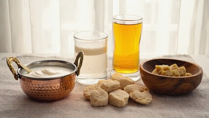 A beautifully arranged display of assorted fermented foods featuring yogurt, kefir, and miso. This image showcases healthful ingredients that enrich diets.
