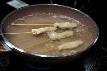 Sempol is Indonesian street food made from chicken cassava flour, some seasonings, and egg, the process of boiling, then frying