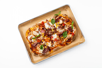 Savor a delightful flatbread featuring succulent grilled chicken, zesty peppers, and fresh basil, beautifully arranged on a rustic tray, ready for sharing or indulging