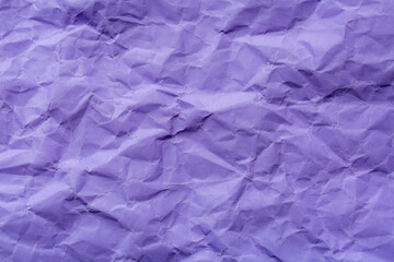Obraz premium Close-up of purple crumpled paper texture,Abstract purple paper texture background. Texture of crumpled craft paper. Paper background. Recycled purple paper backdrop in close up. Violet Textures.