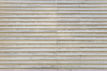Rows of old wooden boards painted white. Abstract vintage background.