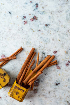 Cinnamon sticks in rustic metal tins 
