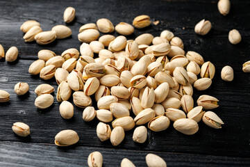 Salted roasted pistachios in their shells. Healthy food