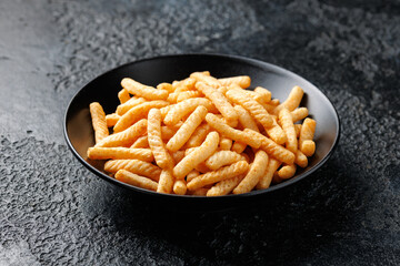 Prawn cracker sticks, fingers. Shrimp crispy snack in a bowl