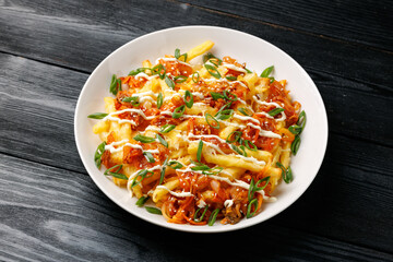 Loaded Kimchi Fries with cheese, mayonnaise and spring onion