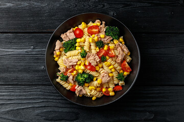 Tuna corn pasta salad with tomatoes and broccoli