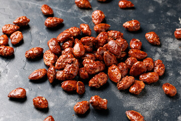 Caramelized almonds. Toasted almonds coated with caramel syrup.