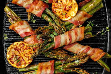 Grilled Bacon Wrapped Asparagus in iron cast pan