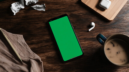 Green device with coffee and ice pieces looks sleek and modern, evoking sense of calm sophistication