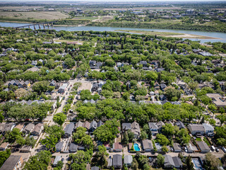 City view from above with houses and a river