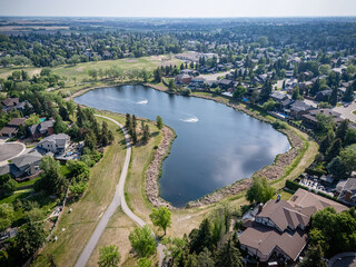 View of a lake with houses in the background