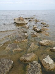 Rocky pathway leading into calm water
