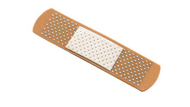 A single adhesive bandage or plaster lying on a white surface with a tan colored strip and pad center