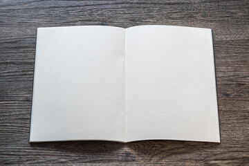 Book mockup with blank opening page a4 paperback mock up for catalog, magazine, menu, booklet, notebook, portfolio design template on wood table background