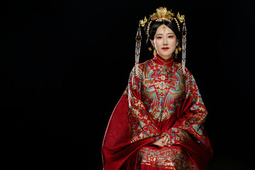 Woman wearing Chinese Ming Dynasty Hanfu clothing against black background