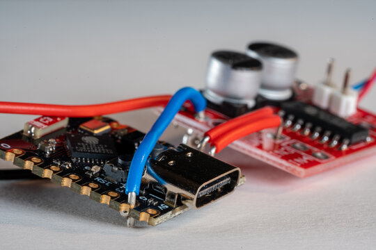 Macro of ESP32 mini board with soldered motor controller and wiring