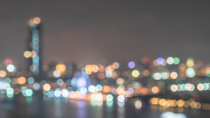 City blur background rooftop party view cityscape business hotel, corporate office building landscape on river bank, blurry night lights skyline nightlife bokeh