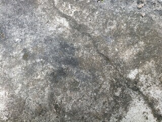 Rough Concrete Texture with Natural Cracks and Weathering. Image of a rough concrete surface with cracks and weathered details, perfect for textures and backgrounds