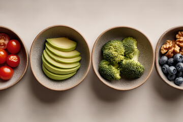 Clean and bright flat lay of healthy anti-aging foods in ceramic bowls