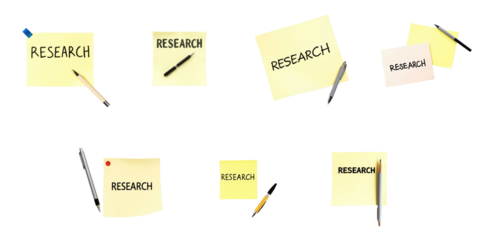 Collection of Sticky Notes with Research Text and Writing Instruments Connected to transparent Background