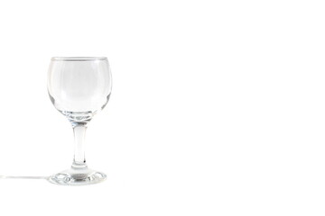 On a white background there is a stemmed glass for champagne and wine.	