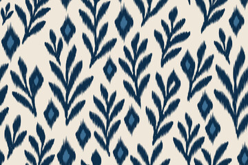 Ikat pattern seamless blue textile design with leafy abstract floral ornaments. Traditional ethnic fabric motif perfect for fashion, home decor, wallpaper, crafts, wrapping, and surface design.