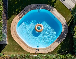 aerial view of a swimming pool featuring an inflatable ring