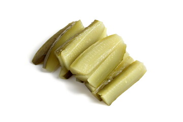 Sliced ​​pickled cucumber lies on a white background.