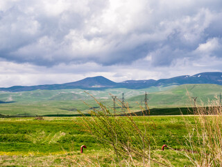 gray clouds over mountains and field in Syunik