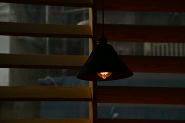 Close-up of the lighting indoors. Light bulb. Interior design, decoration. Lighting equipment.