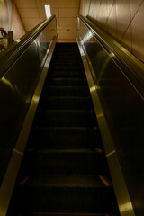 Close-up of the escalator. escalator convergence line. Indoor view.