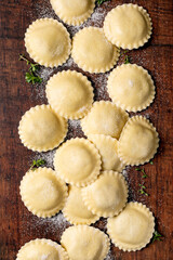 Fresh Ravioli Pasta on Wooden Board