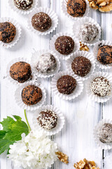 Homemade raw vegan Energy Balls With Different Toppings