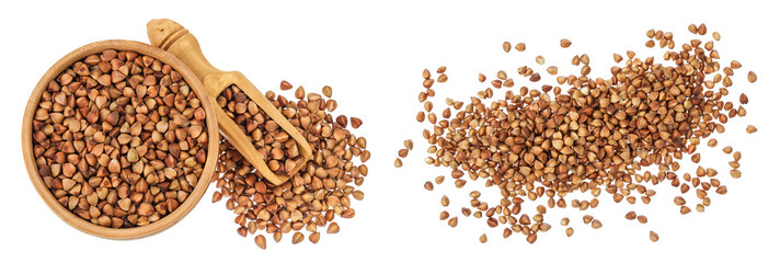 Raw buckwheat in wooden bowl isolated on white background. Top view. Flat lay