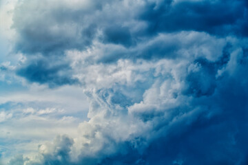 An intentionally soft-focus image of a dramatic sky with evocative clouds, designed as a subtle backdrop for creatives—allowing foreground elements in web or media projects to take center stage