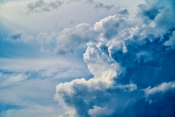 An intentionally soft-focus image of a dramatic sky with evocative clouds, designed as a subtle backdrop for creatives—allowing foreground elements in web or media projects to take center stage