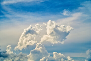 An intentionally soft-focus image of a dramatic sky with evocative clouds, designed as a subtle backdrop for creatives—allowing foreground elements in web or media projects to take center stage