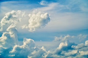An intentionally soft-focus image of a dramatic sky with evocative clouds, designed as a subtle backdrop for creatives—allowing foreground elements in web or media projects to take center stage