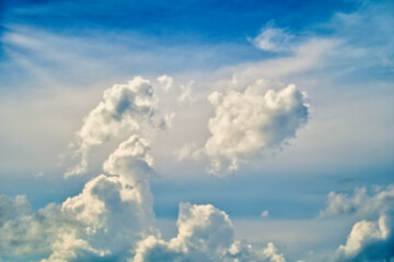 An intentionally soft-focus image of a dramatic sky with evocative clouds, designed as a subtle backdrop for creatives—allowing foreground elements in web or media projects to take center stage