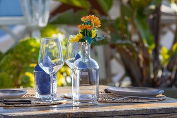 Charming Table Setting with Fresh Flowers and Elegant Glassware