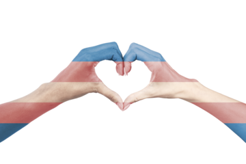 Closeup of women couple’s painted hands with the transgender flag forming a heart shape. Symbol of LGBTQ pride, love, diversity, inclusion, equality, and human rights. Isolated on white background